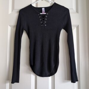 Black ribbed lightweight sweater with lace up neck